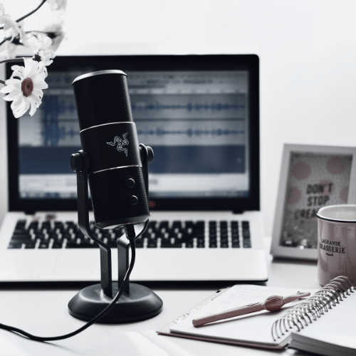 Podcast microphone and laptop
